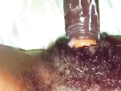 Big dildo inside black hairy wet pussy