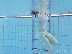 White swimsuit with tattoos – babe Roxalana Cheh underwater