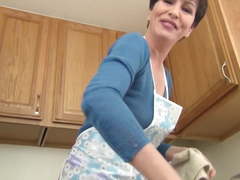 Mommy teasing in the kitchen...