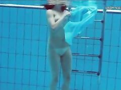 Piyavka Chehova swims naked in the pool and strips