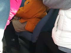 Two cute chinese chicks on bus