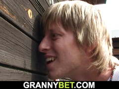 Big-cocked guy fucks busty grandma in changing room