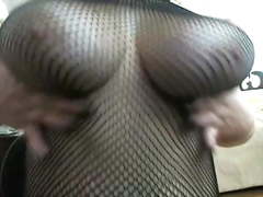 Fishnet bodystocking tease