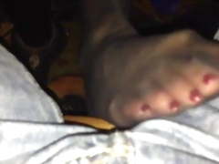 Feet under table restaurant