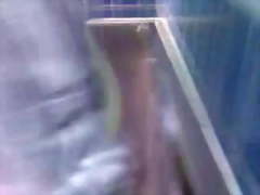 Old man wanking in public toilet