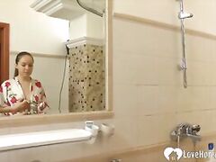 Brunette girlfriend shaves her pits and her pussy