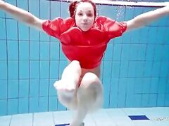 Sexy naked twat Avenna swims nude in the pool